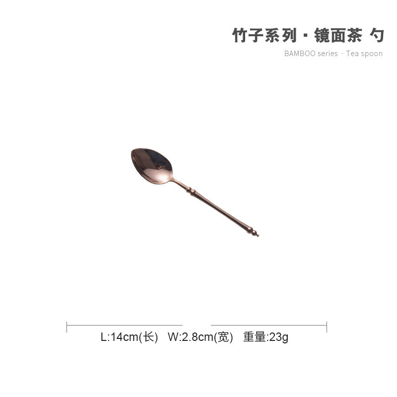 A stainless steel knife and fork set