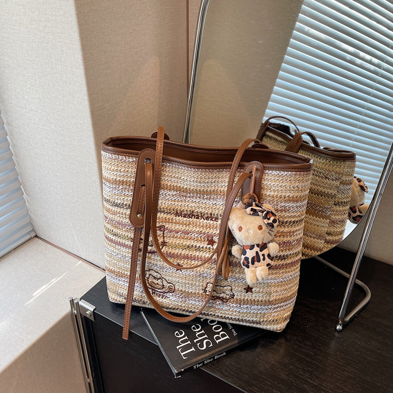 A straw bag shoulder bag