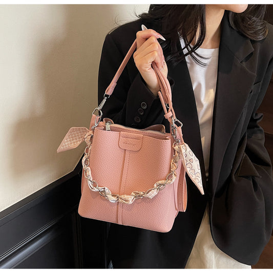 A handbag shoulder messenger bag
