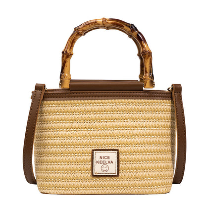 A summer new textured bamboo handle woven bag Thailand travel vacation fashion messenger straw bag