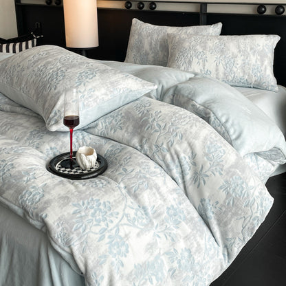 A four-piece quilt cover on the bed