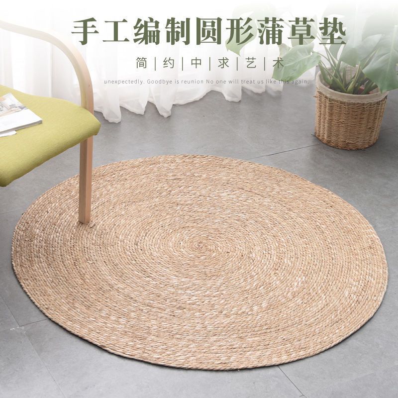 A handmade grass rattan woven carpet floor mat