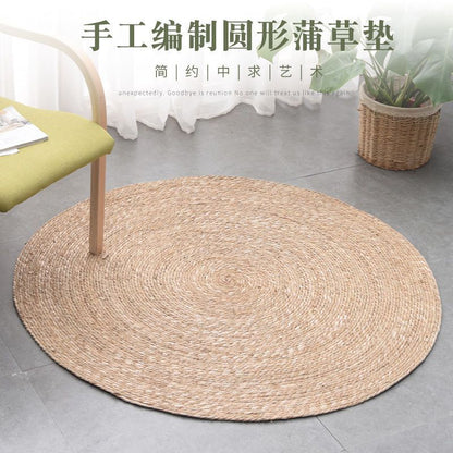 A handmade grass rattan woven carpet floor mat