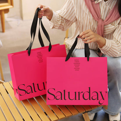A clothing store tote bag custom paper bag premium sense printing logo high-end ins style high value women's clothing store shopping bag