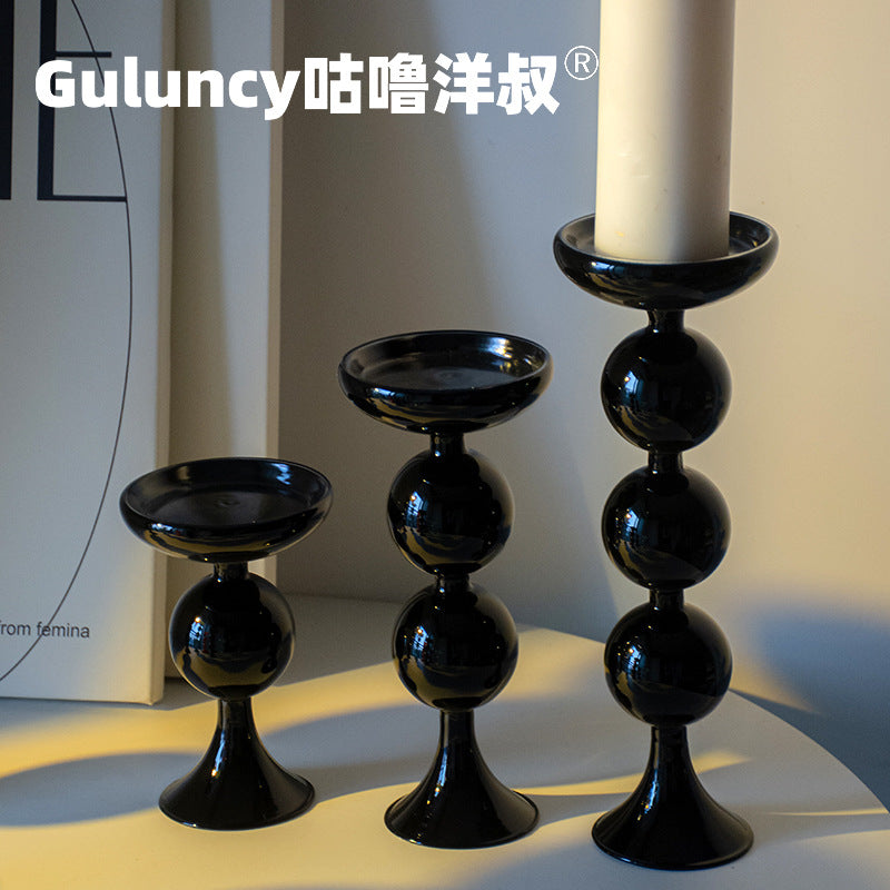 A vintage French Roman column glass candle holder