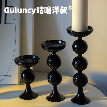 A vintage French Roman column glass candle holder