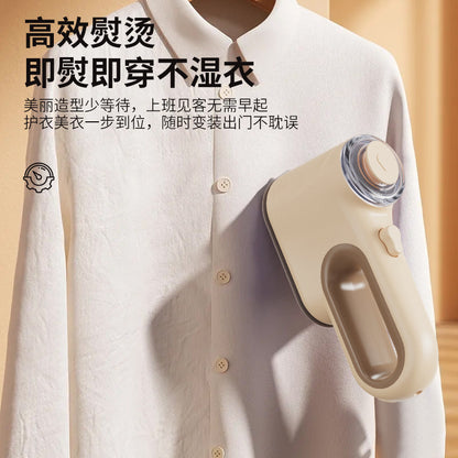 A portable hand-held ironing machine steam iron