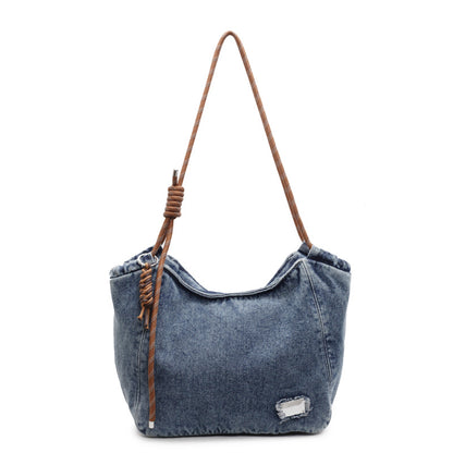 A denim shoulder bag