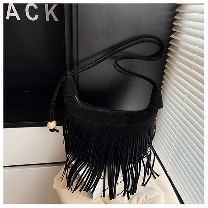 A fringed shoulder bag