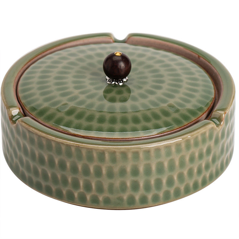 A creative large ceramic ashtray with lid light luxury high sense
