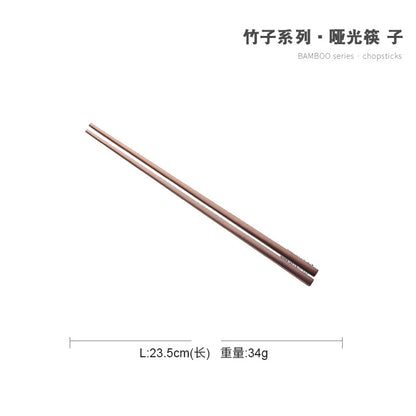 A stainless steel knife and fork set