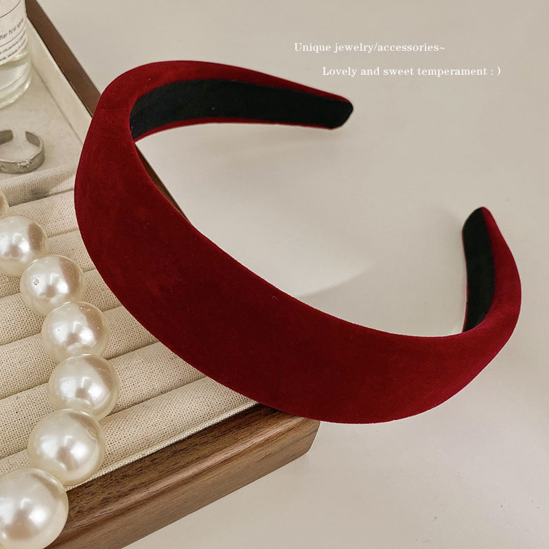 A new autumn and winter red velvet headband retro female Internet celebrity pressure hair wide edge high skull top hair accessories simple temperament headband
