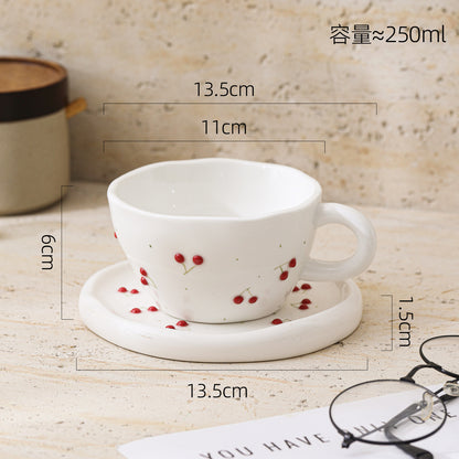 A Embossed Ceramic Coffee Cup and Saucer Set