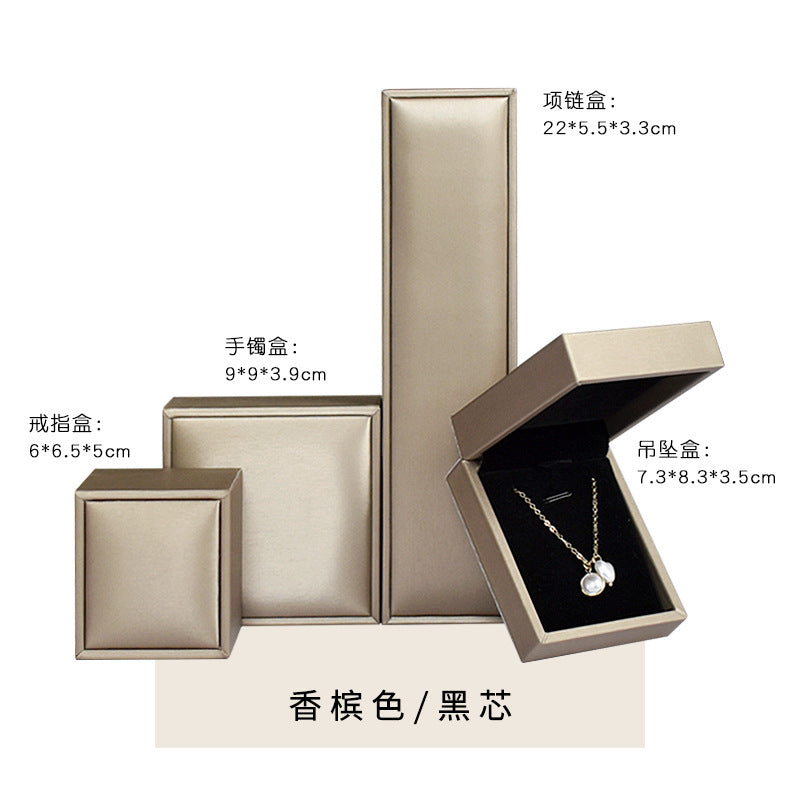 A brushed PU leather bronzing LOGO jewelry box