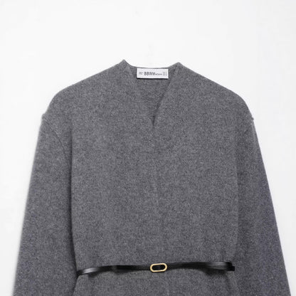 A knitted cardigan sweater jacket