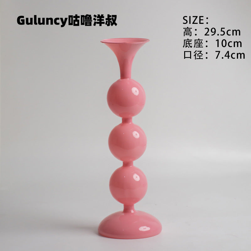 A vintage French Roman column glass candle holder