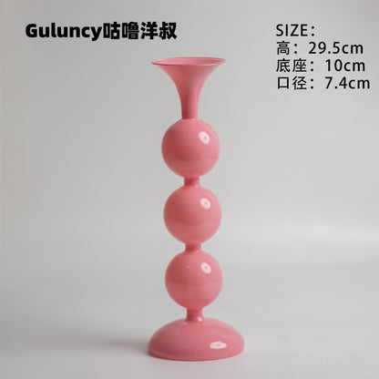 A vintage French Roman column glass candle holder