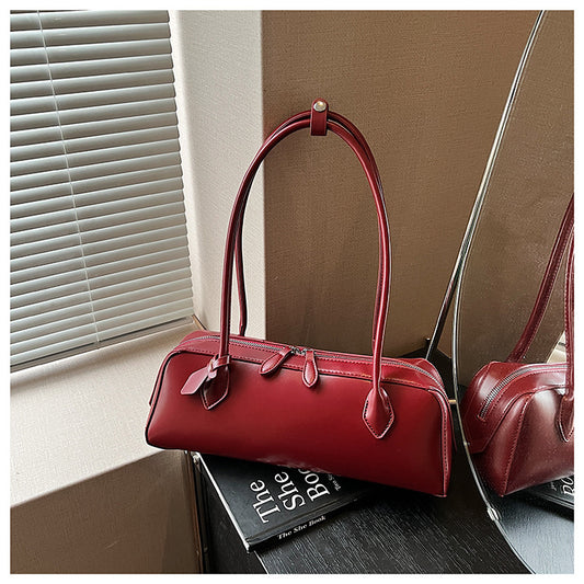A handbag shoulder bag
