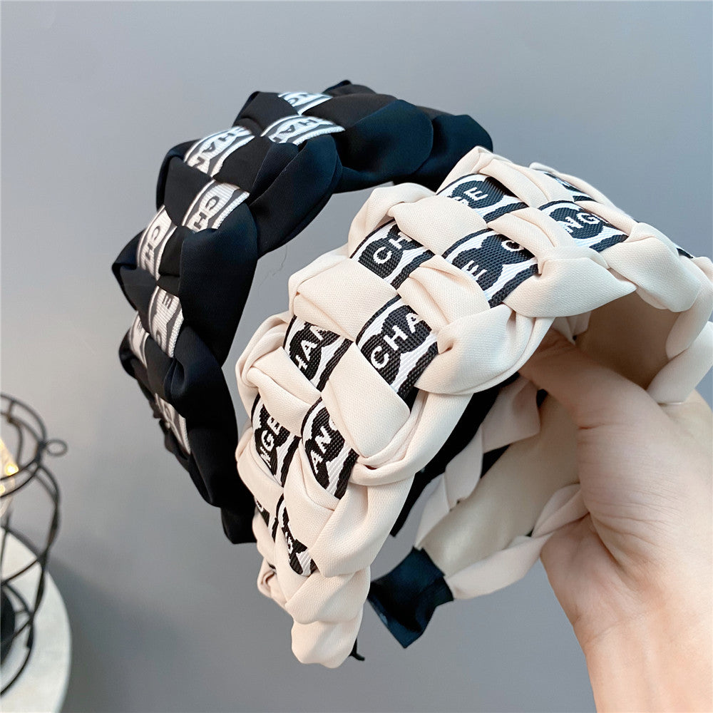 A Korean retro letter plaid headband, four-strand braided personalized hair accessories, wide-brimmed small fragrant headband