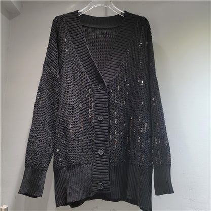 A long-sleeved V-neck sequined knit top