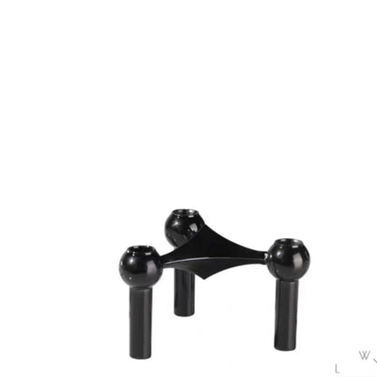 A tripod candlestick alloy decorative ornament