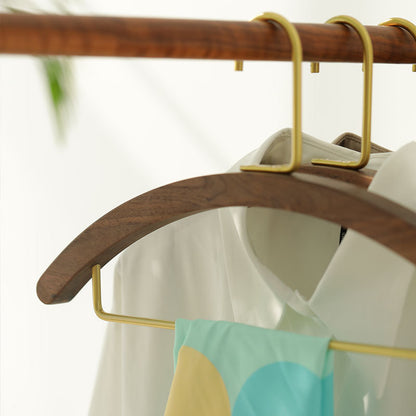 A semi-circular black walnut solid wood hanger