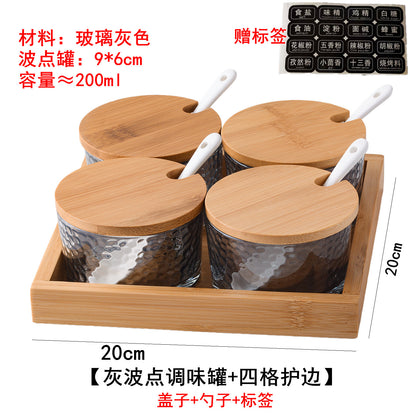A kitchen seasoning box bamboo cover glass jar
