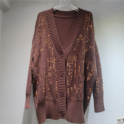 A long-sleeved V-neck sequined knit top