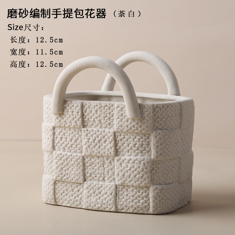A ceramic handbag vase ornament