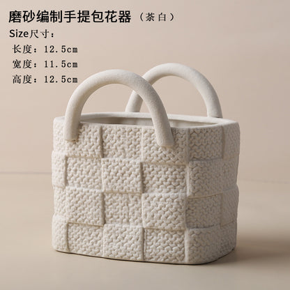 A ceramic handbag vase ornament