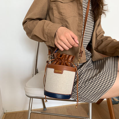 A hand-held cylindrical shoulder bag trendy retro canvas contrasting messenger bag - Mixbatch