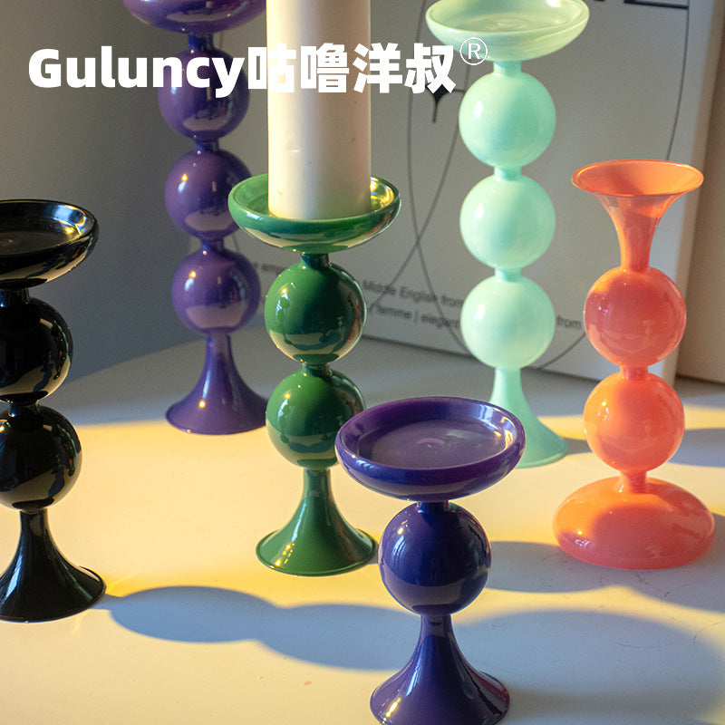 A vintage French Roman column glass candle holder