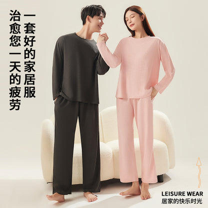 A men's and women's same pajama set