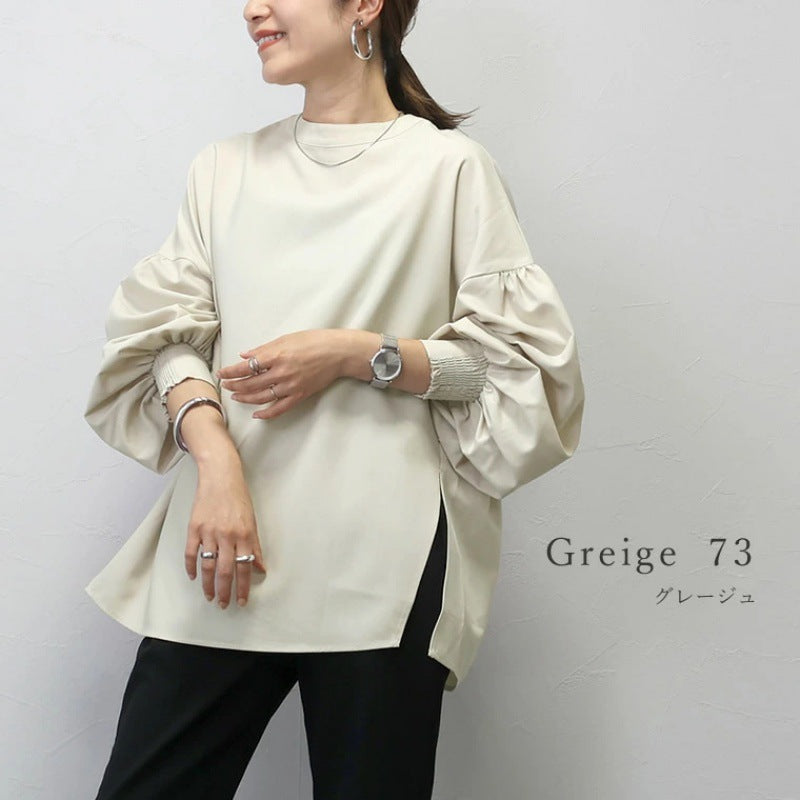 A crewneck long-sleeved top