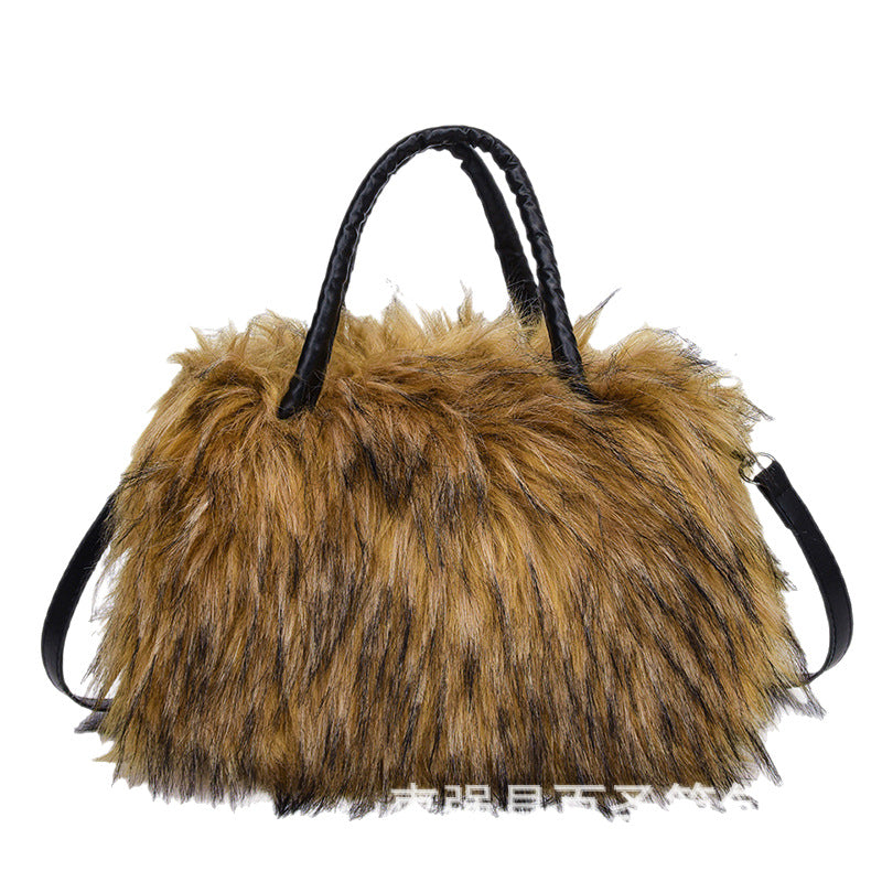 A Plush raccoon fur handbag