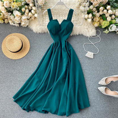 A backless solid color waist V-neck long dress women's dress