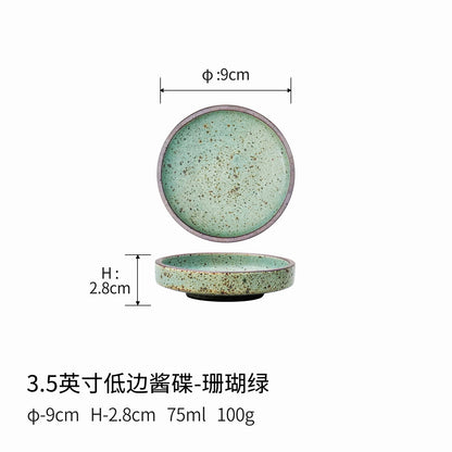 A rough pottery dipping sauce dish