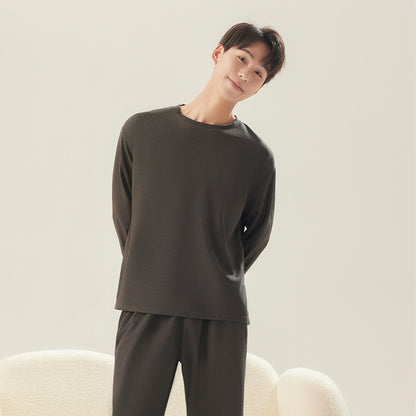 A men's and women's same pajama set