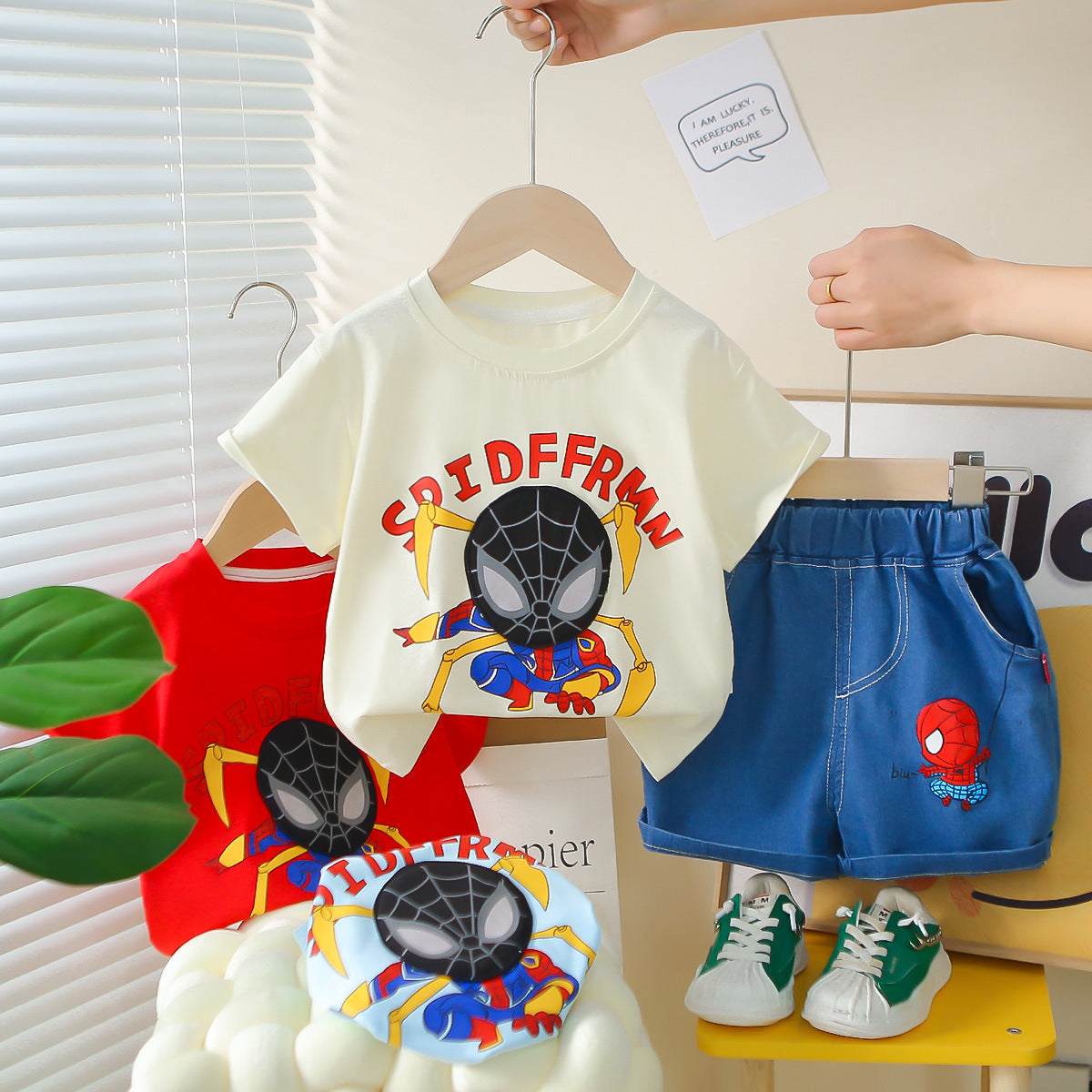 A summer new boys cartoon round neck short-sleeved suit boys casual denim shorts two-piece set hair