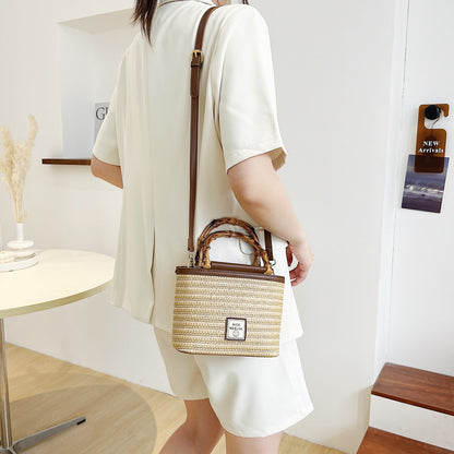 A summer new textured bamboo handle woven bag Thailand travel vacation fashion messenger straw bag
