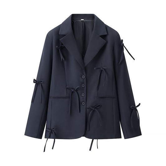 A bow-embellished blazer