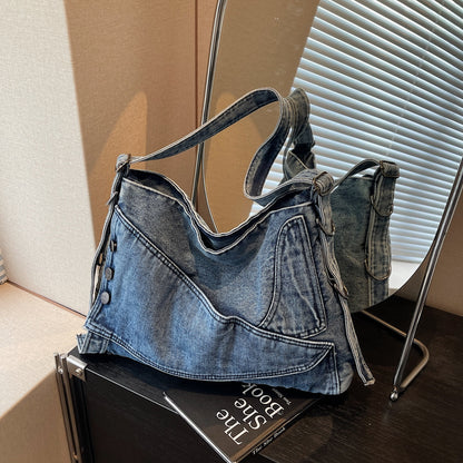 A denim shoulder bag