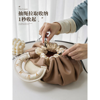 A new lazy drawstring cosmetic bag women's portable waterproof PU travel toilet bag portable storage bag box box