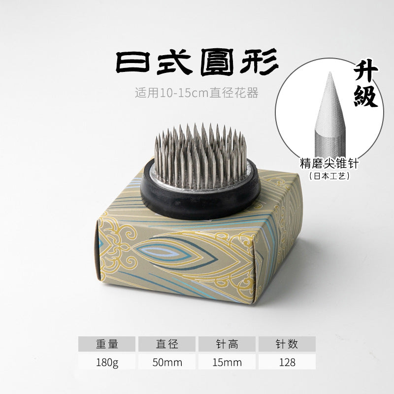 A Stainless Steel Flower Arrangement Base Needle Tool