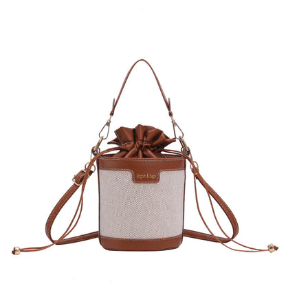 A hand-held cylindrical shoulder bag trendy retro canvas contrasting messenger bag - Mixbatch