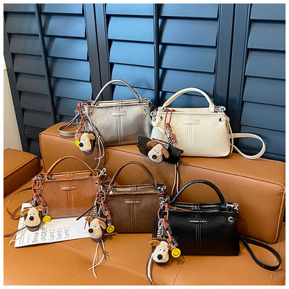 A handbag messenger bag