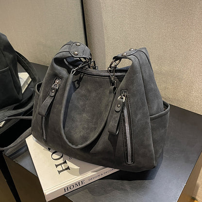 A handbag shoulder messenger bag