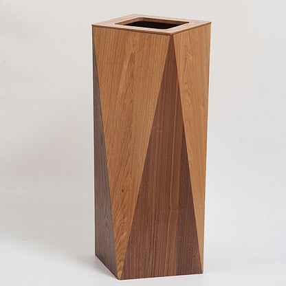 A wooden trash can