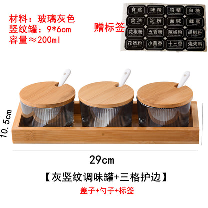 A kitchen seasoning box bamboo cover glass jar