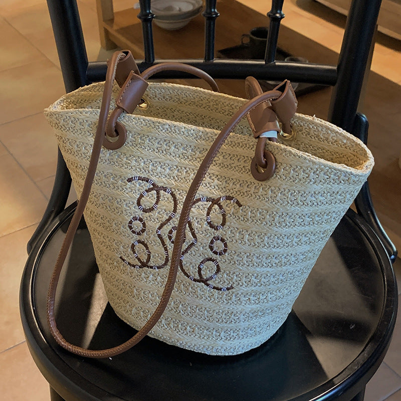 A straw bag shoulder bag